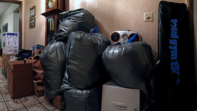 The foyer is filling up with items to be donated or disposed of