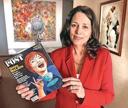 Joan SerVaas with 2013 issue